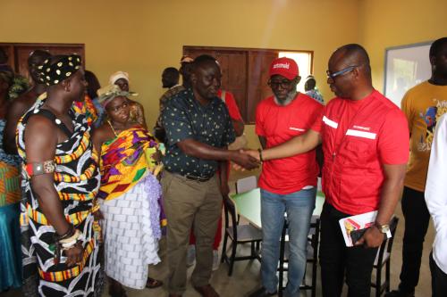 John Nkaw (left) receiving keys from the contractor