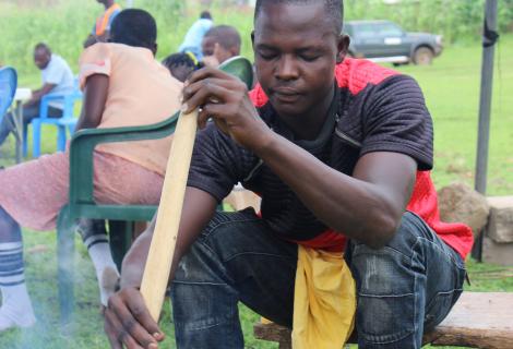 Boabi actively participating in the cooking competition in the Nangodi community, Upper East Region