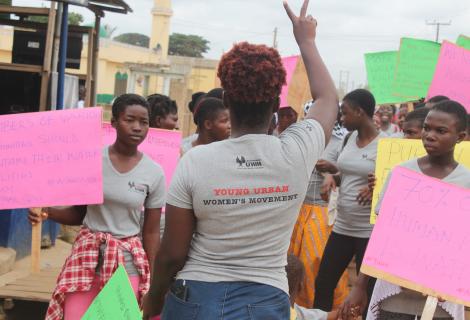 Members of the Young Urban Women's Movement advocate for access to water and gender-responsive public services at the Ga West Municipal Assembly