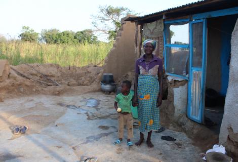 Kanpege and her son, Daniel lost a portion of their home during torrential rains in the Upper East region