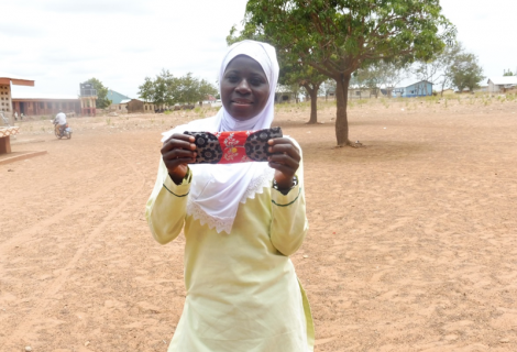 Sadia holding her reusable sanitary pad
