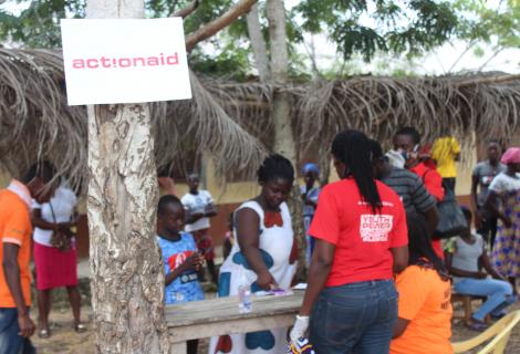 AAG Staff assisting beneficiaries in Amuman, Ga South District, Greater Accra Region