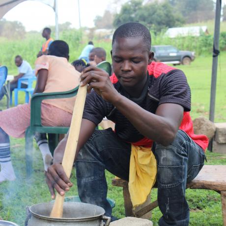 Boabi actively participating in the cooking competition in the Nangodi community, Upper East Region