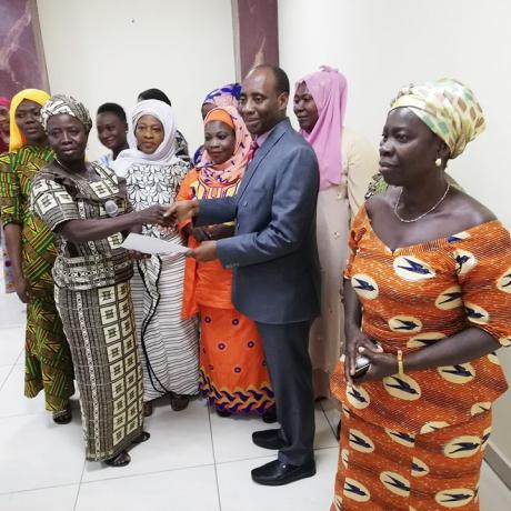 Members of the National Women Farmers' Movement present their communique to government through Sagre Bambangi, Deputy Minister of Food and Agriculture in Charge of Annual Crops