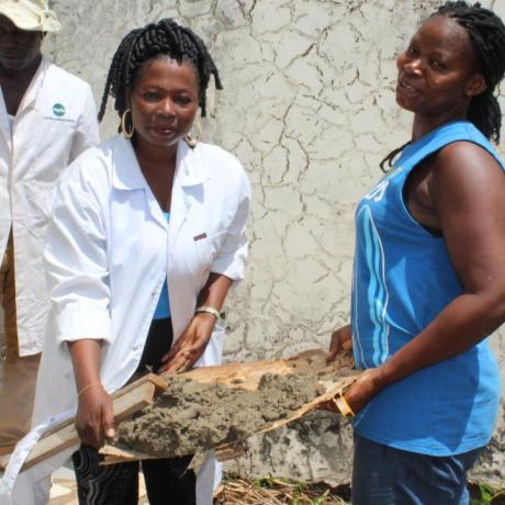Vida Badu and Margaret Okoe, another female beneficiary of the tiling training, during practical training sessions in plumbing
