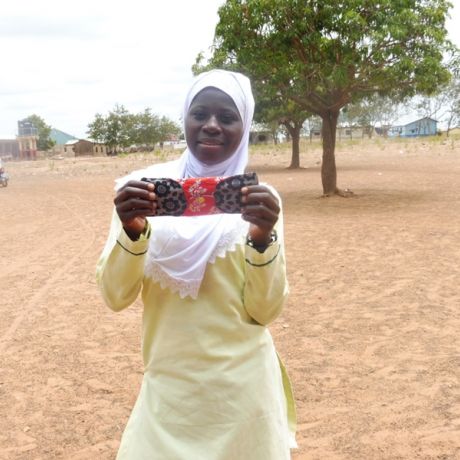 Sadia holding her reusable sanitary pad
